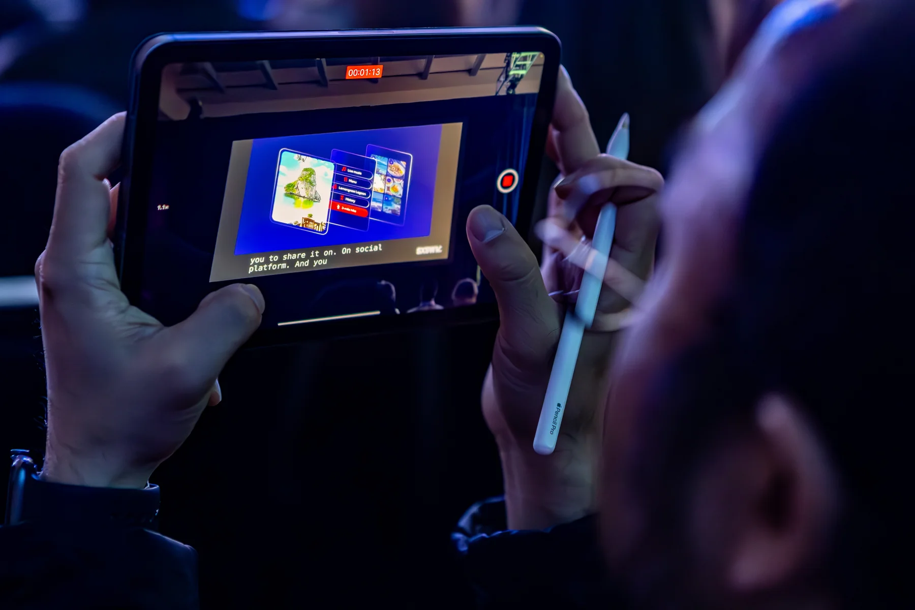 An attendee views the experience on a tablet.